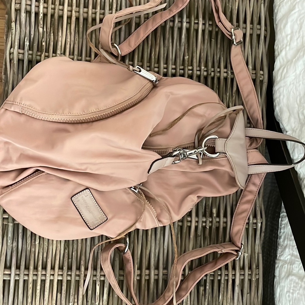 Rebecca minkoff light mauve backpack bag.